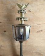 Koetslamp antiek, Ophalen