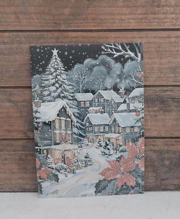 Vintage look kerst-kaart met besneeuwd dorp beschikbaar voor biedingen