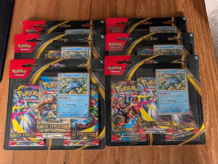 Mega Evolution (Golduck) 3-pack blister, Hobby en Vrije tijd, Verzamelkaartspellen | Pokémon, Nieuw, Overige typen, Foil, Ophalen of Verzenden