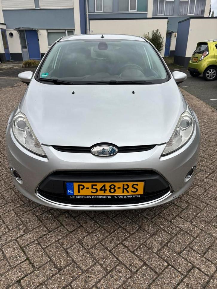 Ford Fiësta 1.4 71KW 5DR 2009 Grijs, Auto's, Ford, Particulier, Airbags, Airconditioning, Elektrische ramen, LED verlichting, Lichtmetalen velgen