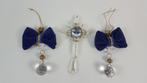 2 blauwe strikken en diamant geslepen glas, glittert! W2