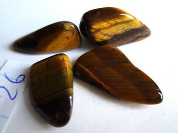 tijgeroog op foto1 samen 0,69 trommelstenen tiger eye kwarts beschikbaar voor biedingen