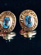 Gouden oorstekers met blauwe topaas, Blauw, Ophalen of Verzenden, Zo goed als nieuw, Met edelsteen