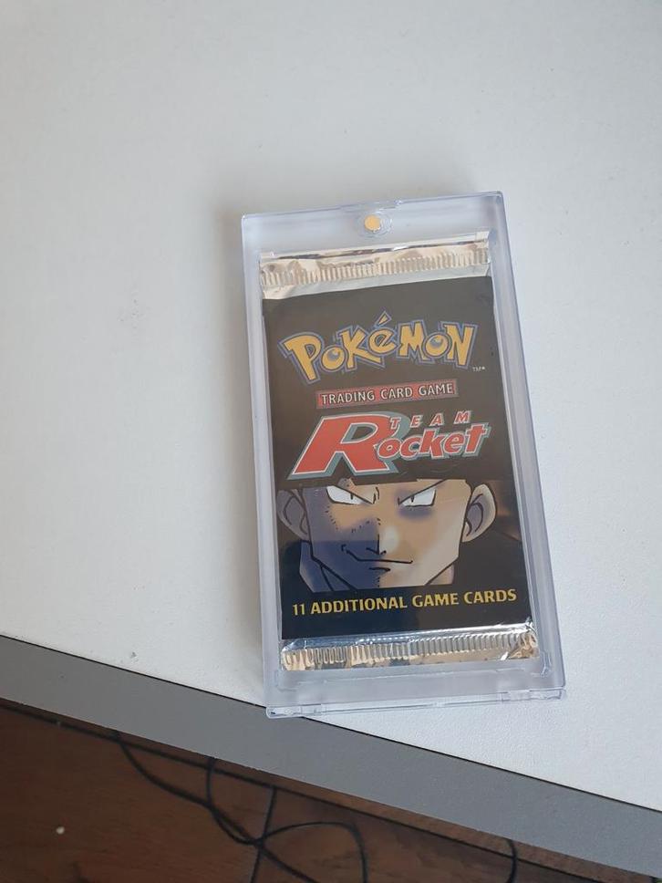 Team Rocket Boosterpack WOTC 1999 Sealed & Gewogen, Hobby en Vrije tijd, Verzamelkaartspellen | Pokémon, Nieuw, Booster, Ophalen