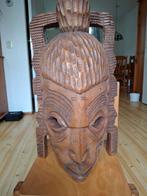 Houten beeld uit Afrika, Ophalen