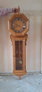 Jeka blank eiken wandklok, Ophalen