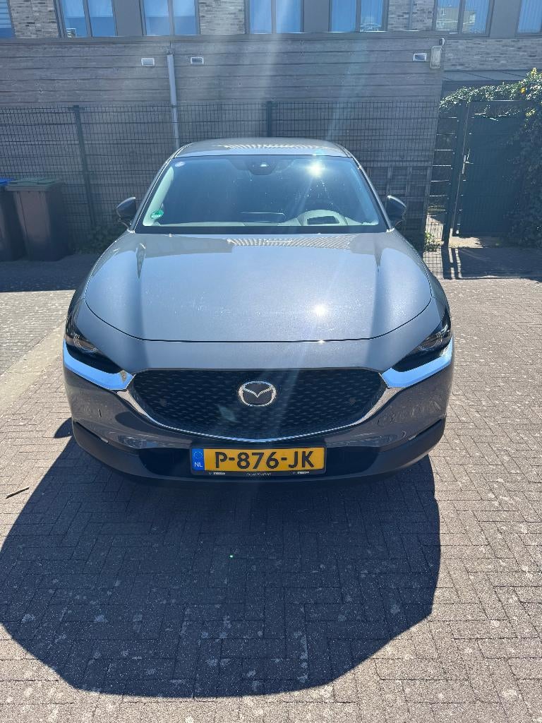 Mazda CX-30 E-skyactiv X 186pk Aut 2022 Grijs, Auto's, Mazda, 1998 cc, Zwart, 75 €/maand, SUV of Terreinwagen