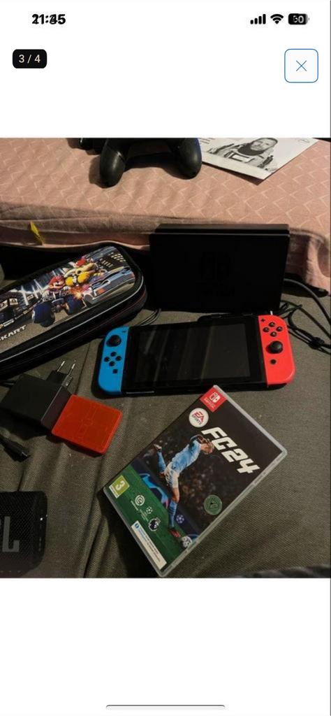 Nintendo Switch met FC24 en extra controllers, Spelcomputers en Games, Games | Nintendo Switch, Gebruikt, Ophalen of Verzenden