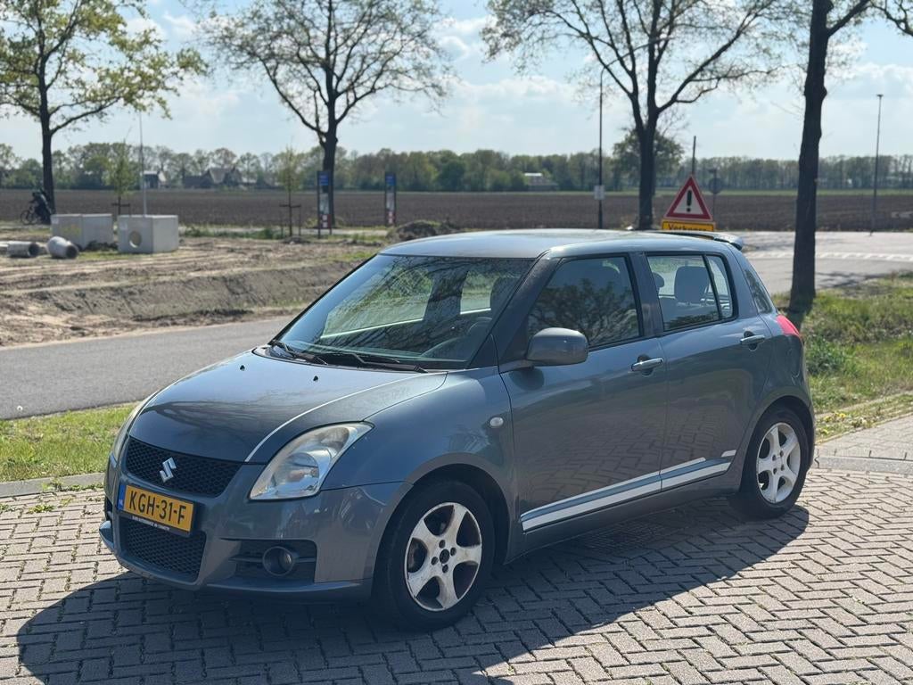 Suzuki Swift 1.3 2007 NIEUWE APK, Voorwielaandrijving, Stof, Stoelverwarming, Bedrijf