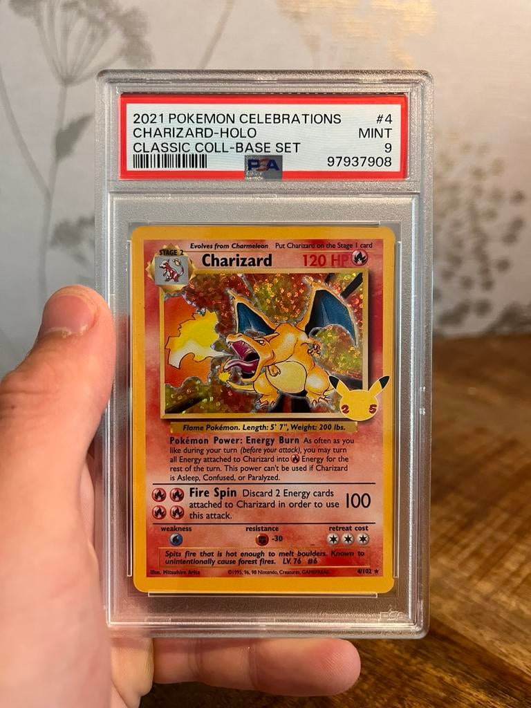 Pokemon TCG - Charizard #4 PSA 9 (Celebrations), Ophalen of Verzenden, Nieuw, Losse kaart, Foil