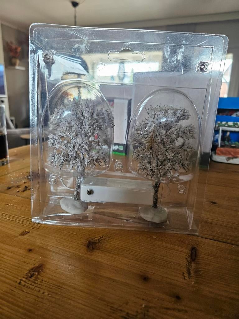 Verlichtte bomen kerstdorp, Ophalen