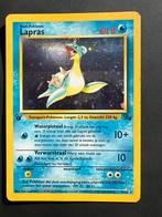 Lapras 10/62 holo first edition fossil  swirl op ze hoorn, Hobby en Vrije tijd, Verzamelkaartspellen | Pokémon, Ophalen of Verzenden