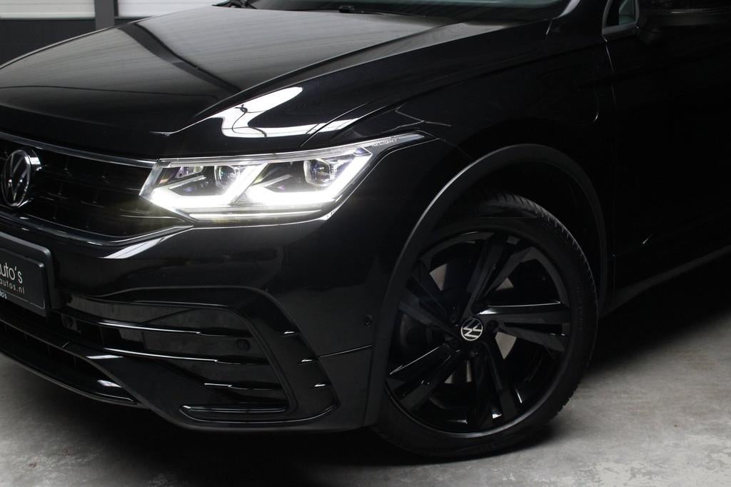 Volkswagen TIGUAN 1.4 TSI eHybrid R-Line l Pano HUD IQ, Met garantie (alle), Zwart, Hybride Elektrisch/Benzine, SUV of Terreinwagen