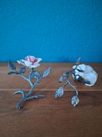 Stenen bloem aan koper takje, Ophalen