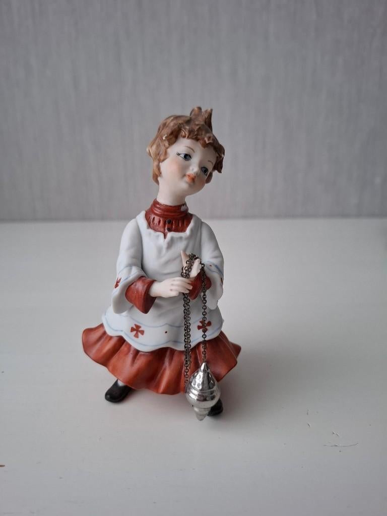 Capodimonte rori misdienaar beeldje, Ophalen