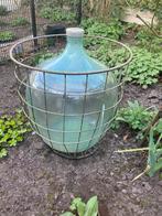 Grote gistfles in metalen mand, Tuin en Terras, Ophalen, Zo goed als nieuw