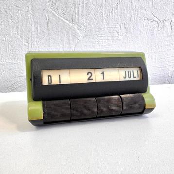 Vintage groene bureaukalender beschikbaar voor biedingen