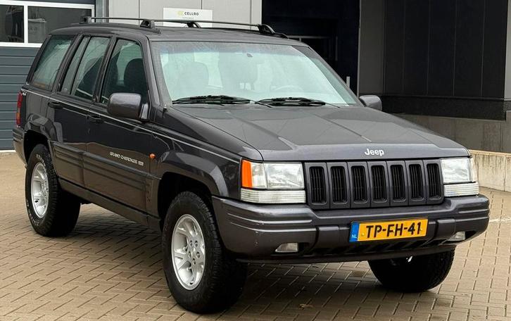 Jeep Grand Cherokee 5.2 I V8 Limited AUT 1998 Grijs, Auto's, Jeep, Bedrijf, Grand Cherokee, 4x4, ABS, Achteruitrijcamera, Airbags