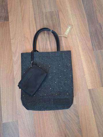 Nieuw zebra tas vilt hartjes beschikbaar voor biedingen