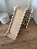 Glimrek met glijbaan, Ophalen