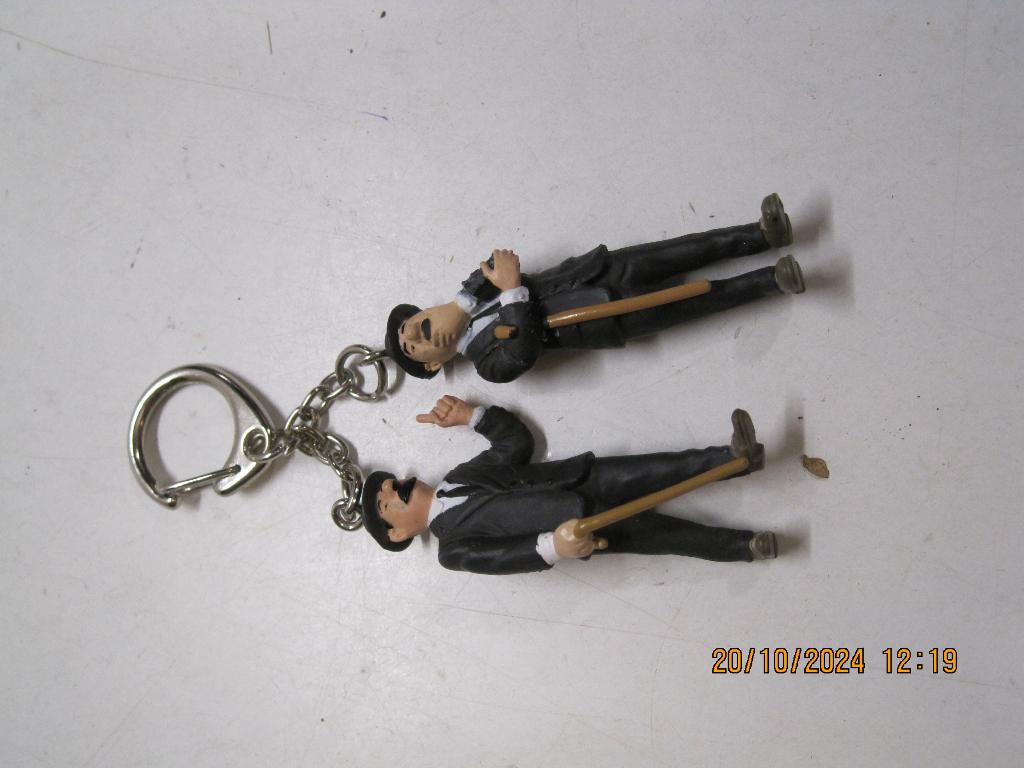 kuifje jansen en jansen sleutelhanger 6 cm lang (318), Ophalen of Verzenden, Kuifje, Gebruikt, Beeldje of Figuurtje