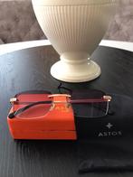 Astos zonnebril met roze glazen, Sieraden, Tassen en Uiterlijk, Zonnebrillen en Brillen | Dames, Nieuw, Overige merken, Ophalen of Verzenden