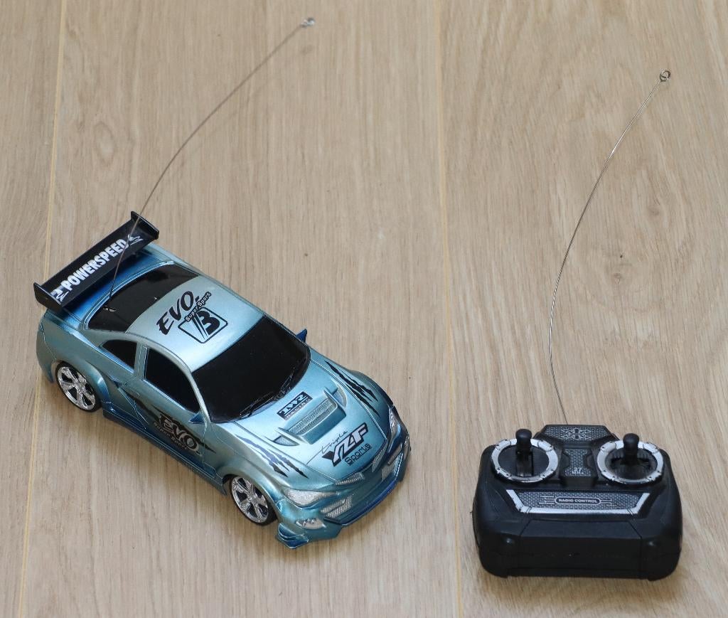 Op afstand bestuurbare raceauto (stuurt niet zo goed), Ophalen of Verzenden, Gebruikt, Afstandsbediening