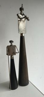 Metalen sculpturen, Ophalen