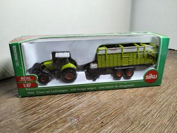 Te koop Siku Claas 850 Axion met Quantum 5700S opraapwagen. beschikbaar voor biedingen