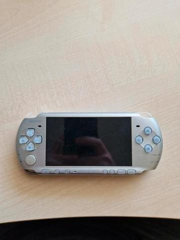 PSP Zilver met Spel beschikbaar voor biedingen