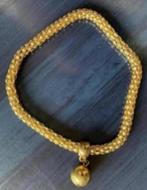 Goudkleurige armband, mouwophouder met balletje, Overige materialen, Ophalen of Verzenden, Zo goed als nieuw, Met bedels of kralen