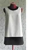 NIKKIE Zwart/ Witte Top met rits achter maat 38 (Nieuw), Maat 38/40 (M), Overige kleuren, Nieuw, Ophalen of Verzenden