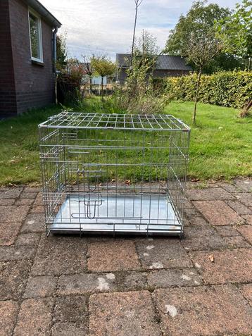 Kleine hondenbench beschikbaar voor biedingen
