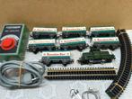 FLEISCHMANN HEINEKEN TREIN  1306 MET 7 HEINEKEN WAGONS, Gelijkstroom, Fleischmann, Ophalen of Verzenden, Gebruikt