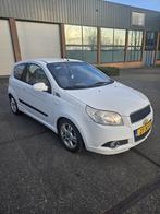 Chevrolet Aveo 1.2 16V 3D 2009 Wit, Auto's, Voorwielaandrijving, Aveo, 4 cilinders, 400 kg
