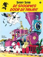 Lucky Luke de spoorweg door de prairie, Gelezen, Eén stripboek, Ophalen of Verzenden, Dupuis