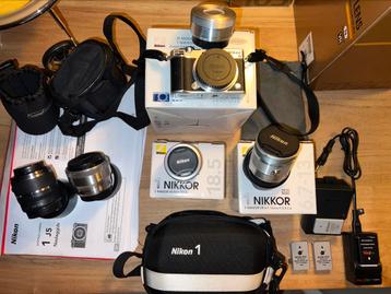 Nikon 1 J5 ZGAN /32mm /18.5mm /6.7-13mm/30-110mm/10-30mm etc beschikbaar voor biedingen
