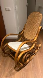 Rotan schommelstoel, Ophalen