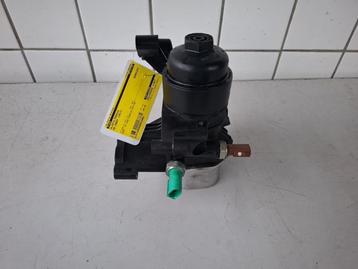 Oliefilterhuis van een Volkswagen Caddy beschikbaar voor biedingen