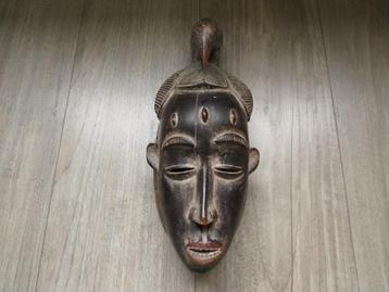 Oud Afrikaans masker met vogel beschikbaar voor biedingen