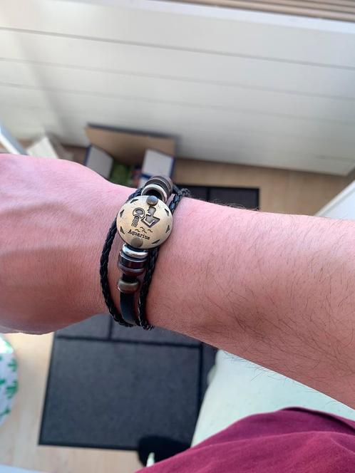 Armband Aquarius, Sieraden, Tassen en Uiterlijk, Kettingen, Zo goed als nieuw, Overige materialen, Zwart, Ophalen of Verzenden