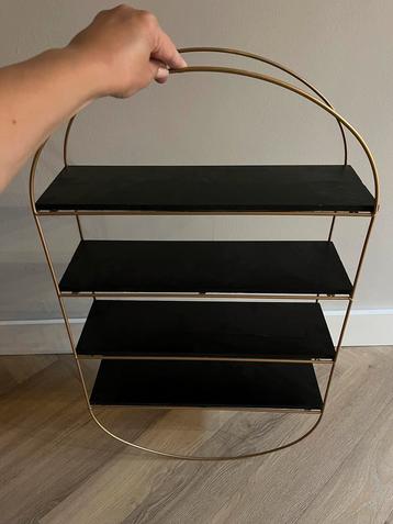 Wandrek zwart met goud.  beschikbaar voor biedingen