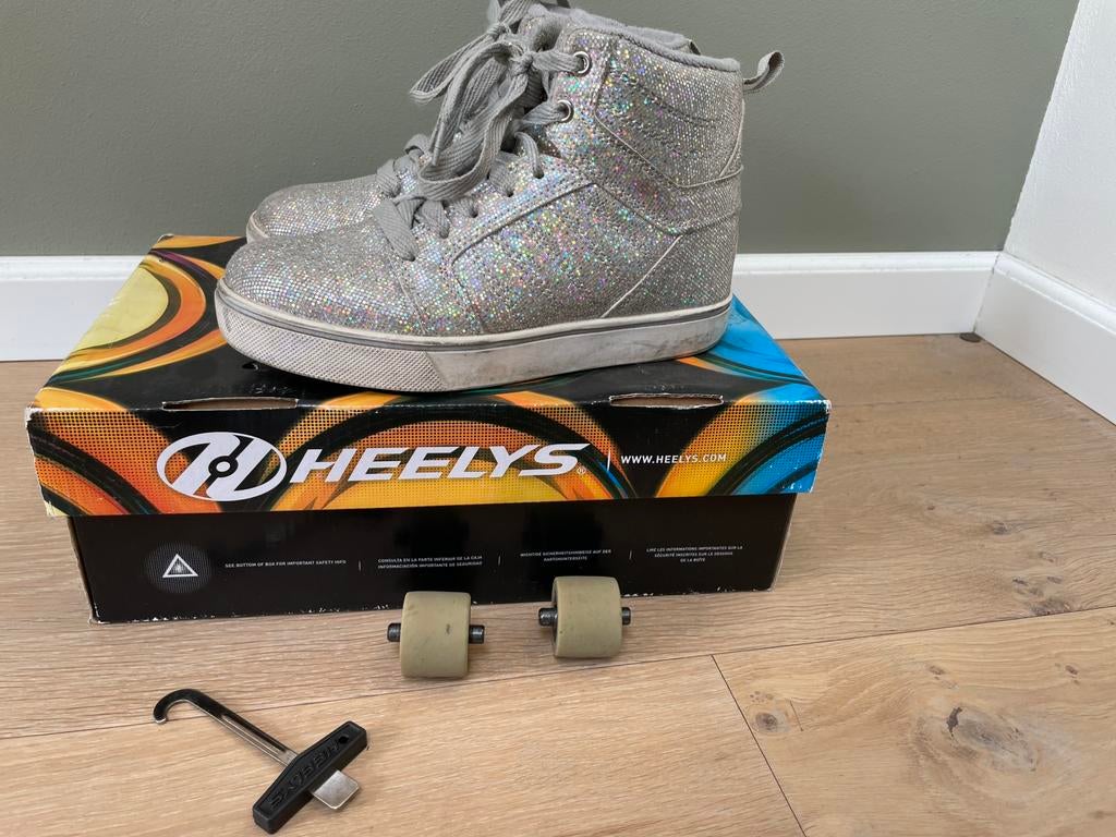 Heelys zilver disco, Kinderen en Baby's, Speelgoed | Buiten | Rolschaatsen, Ophalen of Verzenden, Gebruikt, Kinderen