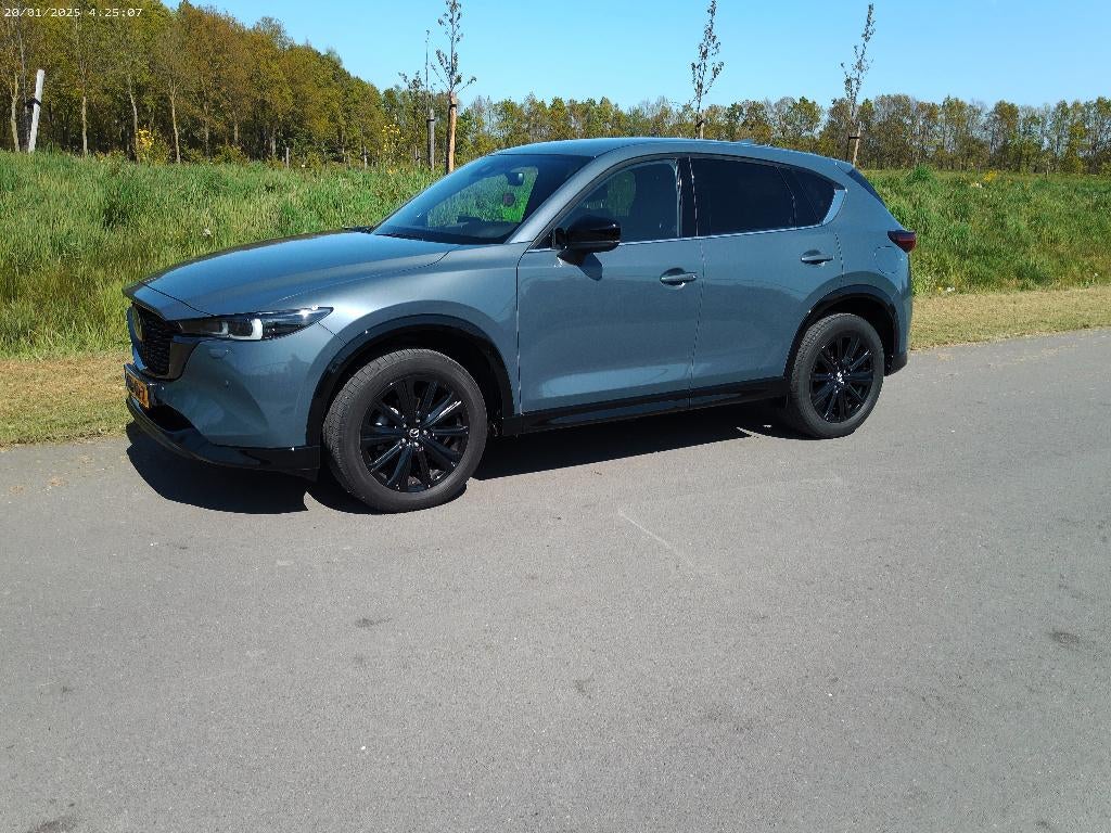 Mazda CX-5 2.0 Skyactiv-g 165pk 2WD Aut 2024 Grijs Homura, Auto's, Mazda, 164 pk, Zwart, 2000 kg, SUV of Terreinwagen