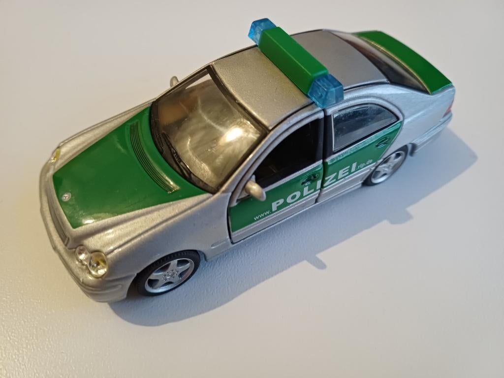 Mercedes C Polizei, Duitsland, Hobby en Vrije tijd, Modelauto's | 1:43, Ophalen of Verzenden, Nieuw, Auto, Overige merken