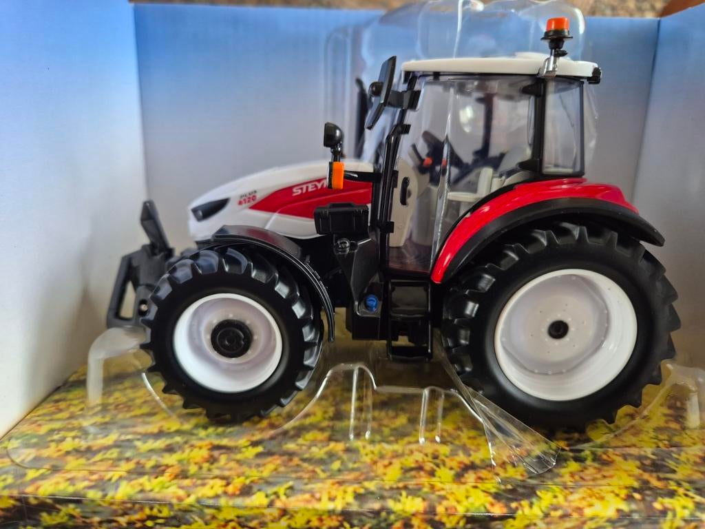 Britains Steyr 4120 Plus modeltractor, Hobby en Vrije tijd, Ophalen of Verzenden