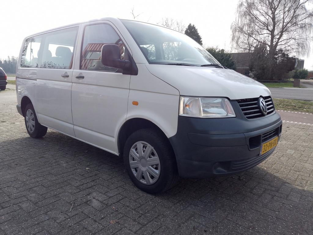 VW Transporter T5 1.9TDI 9 pers 2004, Auto's, Bestelauto's, Voorwielaandrijving, Stof, Wit, Grijs