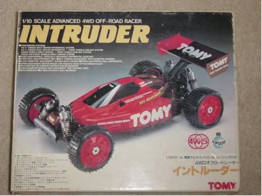 GEVRAAGD: Tomy Intruder of Adonis rc auto, Ophalen, Zo goed als nieuw, Overige schalen