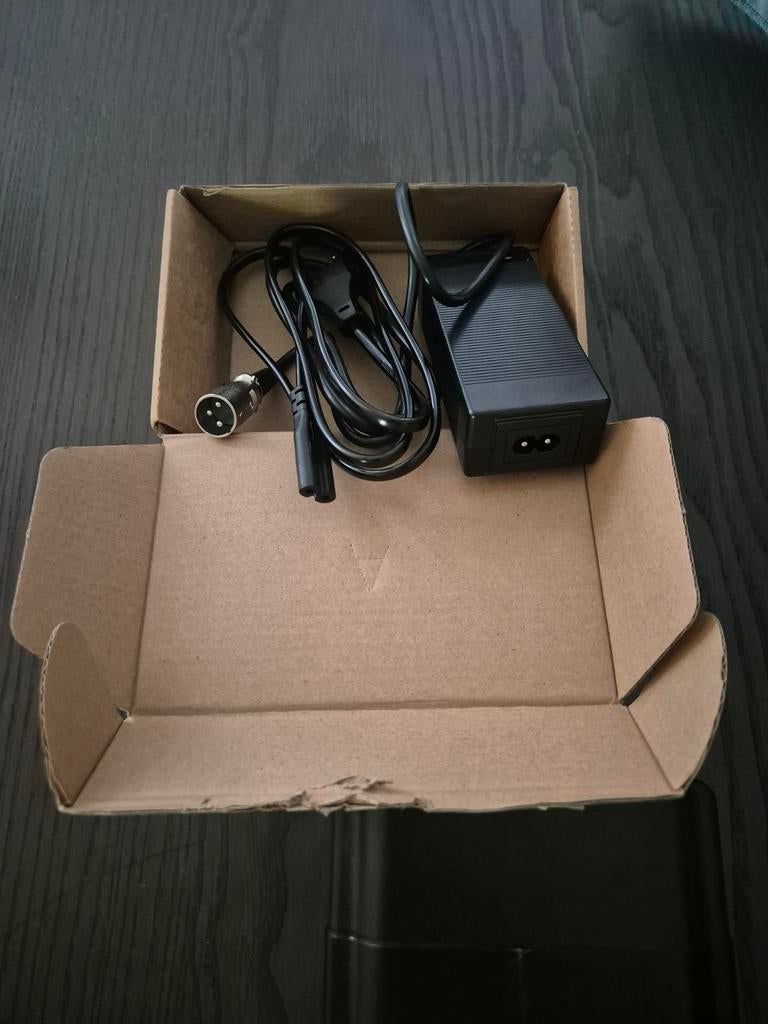 Lader voor elektrische fiets (Knaap, AMS, RTD), Fietsen en Brommers, Fietsaccessoires | Fietsaccu's, Nieuw, Ophalen of Verzenden