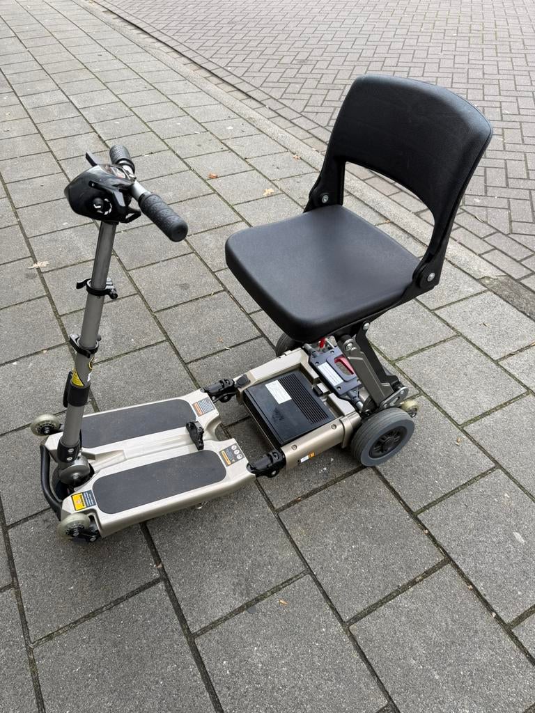 Zo goed als nieuw opvouwbare scootmobiel mango luggie, Ophalen, Inklapbaar, Zo goed als nieuw, Elektrische rolstoel